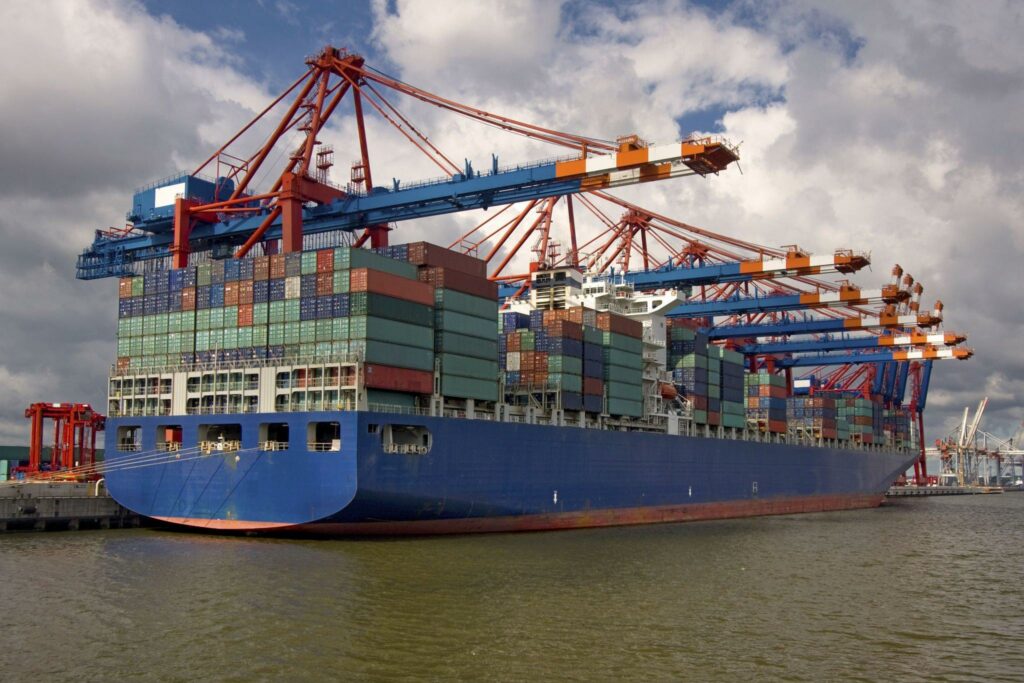 How did standardized containers improve shipping? how did standardized containers improve shipping